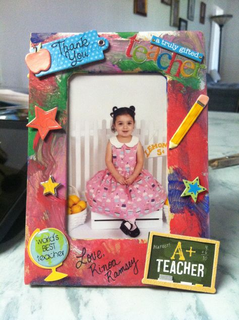 Thank you picture frame for teacher. Had my daughter paint the frame, paper mâché frame from hobby lobby, and found the teacher stickers to put around the border. Wrote a thank you on the back of the frame and placed her school picture in. Spent $1.99 on the frame and $2.99 on the stickers. Used washable crayola paint and let her go! We had fun making this homemade gift! Teacher Frame Gifts, Diy School Years Picture Frame, Crayola Paint, Box Frame Art Teacher, Ideas For Teacher Appreciation Week, Teacher Appreciation Picture Frame, Custom Teacher Gifts Frame, Thank You Pictures, Teacher Crafts