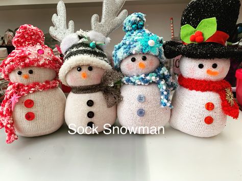 Sock Christmas Ornaments, Christmas Sock Snowman, Sock Snowmen With Rice Diy, How To Make Snowmen Out Of Socks, Dollar Tree Sock Snowman, Snowman Made Out Of Socks, Christmas Sock Crafts, Sock Snowman Craft With Rice, Christmas Sock Dolls