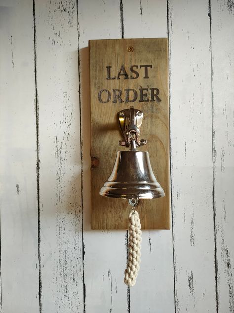 Personalised Last Orders Bell, Bar Accessories, Mancave Accessories Our last orders bell is the perfect accessory for any home bar or man-cave.  The bells is Aluminium, featuring a classic ringer with rope handle the bell is easy to ring and can make a loud, unique sound that is sure to get anybody's attention.  Instead of Last Orders, you can opt for wording of your choice which will be lasered engraved. MAIN PICTURE SHOW  # Natural FINISH -LAST ORDER  #OAK WAX FINISH- Darren's Pub ALL COLOURS Irish Bar Ideas Pub Design, Pub Bar Ideas, Bar Interior Design Pub, Pub Design Interiors, Farmhouse Basement Bar Ideas, Pub Decor Ideas, Country Pub Interior, British Pub Interior, Bar Accessories Ideas