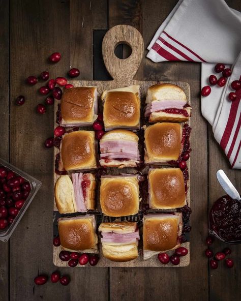 Cranberry ham and cheese sliders combine the sweet tartness of cranberry sauce with savory ham and creamy provolone cheese, all sandwiched buns with a sweet buttery glaze! Cranberry Ham, Chopped Italian Sandwich, Bacon Cracker, Savory Ham, Ham And Cheese Sliders, Cheese All, Cheese Sliders, Italian Sandwich, Cranberry Cheese