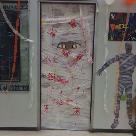 DIY Halloween Decorated Door. #mummy #scary #decorations #school #toiletpaper Dorm Door, Scary Decorations, Diy Halloween, Halloween Diy, Door Decorations, Halloween Decorations, Halloween, Like Button, Saying Goodbye