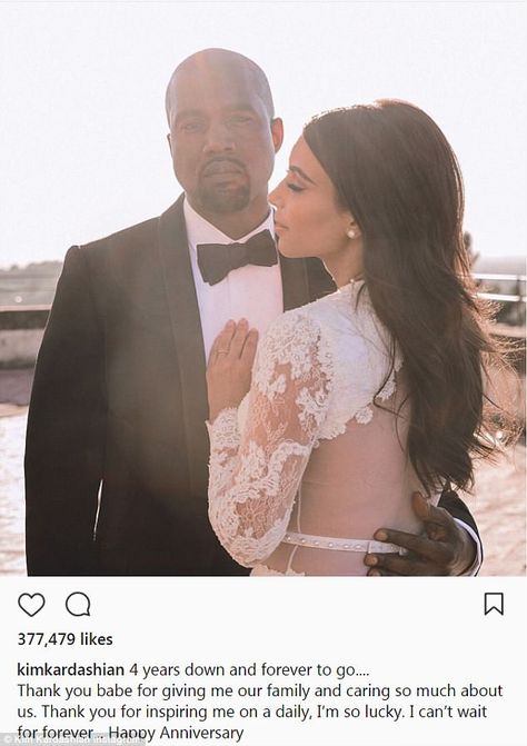 Happy lady: Kim Kardashian shared a lot of praise for her husband Kanye West on their fourth wedding anniversary on Thursday Kanye West Wedding, Kim Kardashian Wedding, Kardashian Wedding, Happy Lady, Wedding Hairstyles And Makeup, Kim Kardashian Kanye West, 4th Wedding Anniversary, Kim And Kanye, Celebrity Wedding Dresses