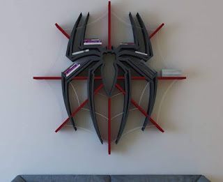 marvel decor interior design | MagOne 2016 Batman Bookshelf, Design Bookshelf, Marvel Decor, Interrior Design, Drukarka 3d, Superhero Wall, Best Superhero, Bookshelf Design, Man Logo