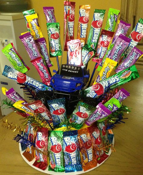 Candy centerpiece Quiz Night Ideas, Candy Centerpiece, Candy Arrangements, Candy Birthday Cakes, Table Decoration Ideas, Candy Birthday, Candy Bouquets, Attributes Of God, Founders Day