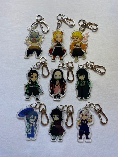 Demon Slayer Anime Chibi Babies in Keychain Form! Get these to match with your Otaku duo/friends!! These keychains are great for decorating bags, keys, ita bags, and more! Options include (in order from the photo and left to right): - Inosuke - Rengoku - Zenitsu - Tanjiro - Nezuko - Muichiro - Obanai - Giyu - Tengen ✦ Acrylic Keychain/Charm ✦ Double-Sided (Design Visible on the Back!) ✦ Accessories: Silver Hook ✦ Measure to approximately ~2-2.5 inches ✦ Vibrant colors If you have any questions, feel free to message me! Stay connected: Muichiro Keychain, Muzan Cute, Rengoku Muichiro, Muichiro Nezuko, Demon Slayer Chibi, Sanemi Genya, Duo Friends, Ita Bags, It Bags