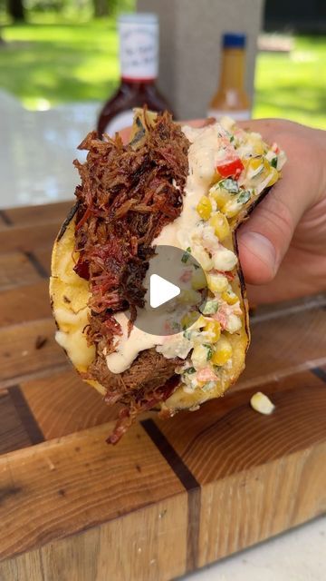 Nick Nesgoda on Instagram: "Smoked BBQ Beef Tacos 

This recipe will be the highlight of your summer using the OG of BBQ sauce and the new Hot Sauce!

Recipe
• Cube up a well marble chuck roast in to ⅙ 
Use @sbrbbq Kickin’ Barbecue Hot Sauce as a binder, then seasoning it up with a salt, pepper, garlic blend, and your favorite bbq rub.
• Place them on the smoker at 275 for 3 hours
• Once the bark is set, remove them and place them in a foil pan with 4 tablespoons of butter, 1 cup cherry cola and Sweet Baby Ray’s Original Barbecue Sauce 
• Cover and foil then place back on the smoker for another couple hours
• Assemble the homemade ranch with: 3/4 cup sour cream, 1/2 cup mayo, 1/4 cup beef broth, 2 tbsp Kickin Barbecue Hot Sauce, 1 tbsp dill, 1 tsp each: garlic powder, onion powder, ½ tsp e Smoked Bbq Beef Tacos, Smoked Chuck Roast Tacos, Bbq Beef Tacos, Cilantro Juice, Bbq Smoker Recipes, Shredded Beef Recipes, Bbq Tacos, Smoked Chuck Roast, On The Smoker