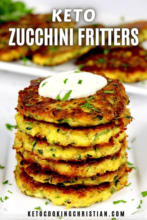 Keto Zucchini Fritters with a homemade dipping sauce are a super tasty and low carb way to put all that delicious summer zucchini to use. They're perfect to serve at brunch, as an appetizer or side dish! #ketoappetizer #ketozucchini #ketosidedish Keto Low Carb Zucchini Fritters, No Carb Zucchini Recipes, Courgette Keto Recipes, Keto Zucchini Fritters Recipes, Keto Recipes Using Zucchini, Keto Stuffed Zucchini Recipes, Easy Keto Zucchini Recipes, Keto Zucchini Side Dish Recipes, Low Carb Zuchini Baking Recipes