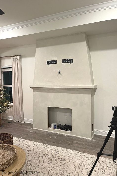 Electric Fireplace With Faux Brick, How To Add A Fireplace To Your Home, Stucco Electric Fireplace, Lime Paint Fireplace, Small Home Fireplace, Roman Clay Fireplace Wall, Roman Clay Electric Fireplace, Roman Clay Over Tile Fireplace, Portola Roman Clay Fireplace