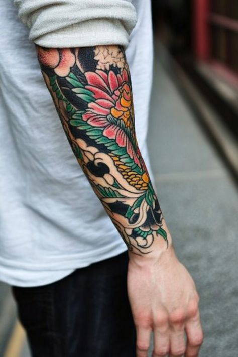 Forearm with a colorful floral and dragon tattoo sleeve. Symbols That Represent Strength, Japanese Tattoo Ideas, Japanese Tattoos For Men, Crane Tattoo, Japanese Plants, Tattoos Inspo, Phrase Tattoos, Octopus Tattoos, Geisha Tattoo