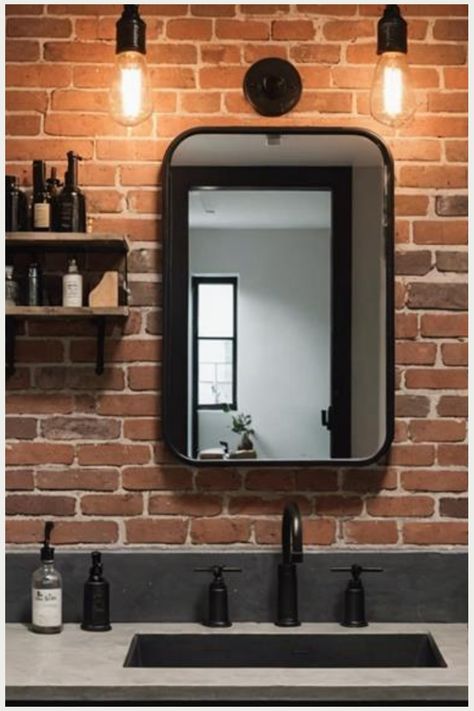 Modern bathroom with brick wall, black-framed mirror, and industrial light fixtures. Industrial Chic Bathroom, Industrial Small Bathroom, Modern Industrial Bathroom Design, Industrial Decor Bathroom, Industrial Bathroom Ideas, Black Bathroom Decor Ideas, Small Guest Bathroom, Modern Industrial Bathroom, Kitchen Flooring Trends