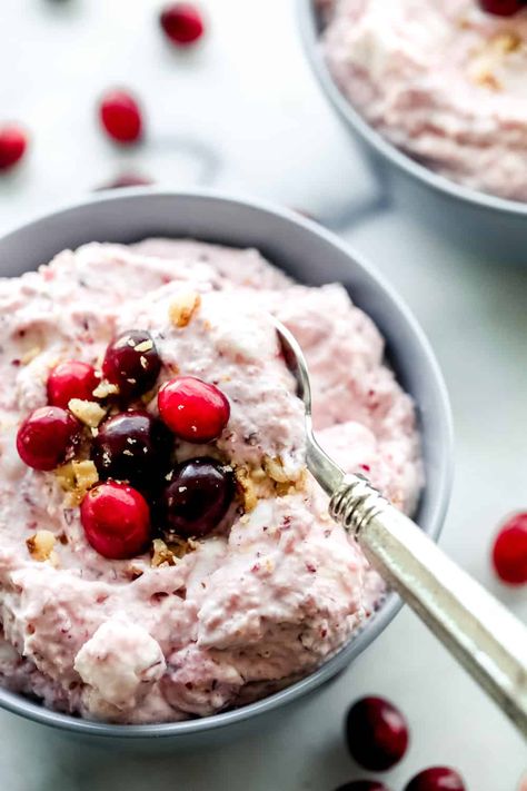 Cranberry Cheesecake Fluff is a creamy and delicious cheesecake fluff salad with cranberries and walnuts.  It is so easy to make and a MUST for the holidays! Cranberry Fluff Salad With Cream Cheese, Fluff Salad Recipes Thanksgiving, Cranberry Jubilee Recipe, Cranberry Cheesecake Fluff Salad, Cranberry Cheesecake Fluff, Cranberry Fluff Salad, Fluff Salads, Christmas Fruit Salad, Cheesecake Fluff