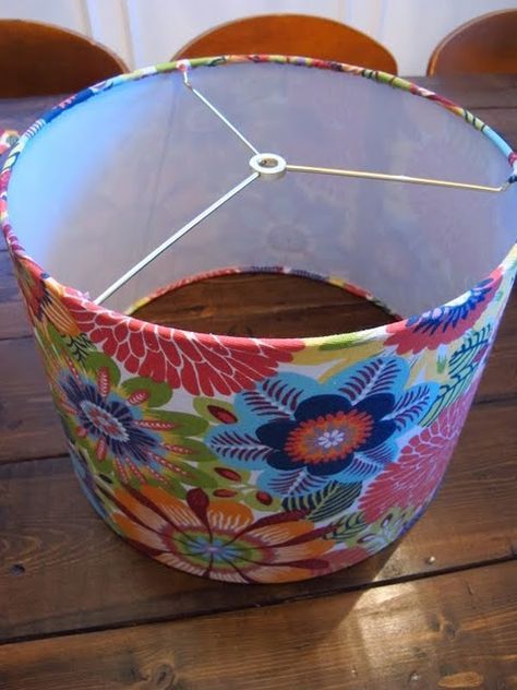 how to cover a lampshade with fabric. I have a few lampshades that could use a makeover.... Diy Loafers Makeover, How To Make A Lamp Shade Frame, Lampshade Trim Ideas, Tie Dye Lamp Shade, Modge Podge Lamp Shade, Diy Lamp Shade Cover, Covering Lampshades With Fabric, Diy Fabric Covered Lampshade, Covering A Lampshade