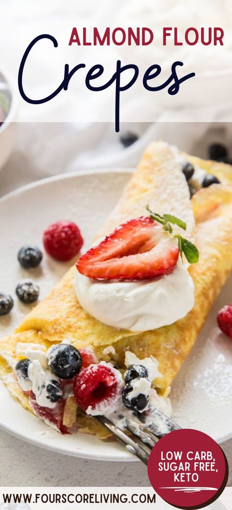 Almond flour crepe on a white plate filled with creamy filling, blueberries, raspberries, and strawberries with a silver fork taking a bite Keto Crepes Recipe, Almond Flour Crepes, Recipe With Almond Flour, Keto Cream Cheese Pancakes, Decadent Cheesecake, Gluten Free Crepes, Recipe Cheesecake, Desayuno Keto, Crepes Recipe