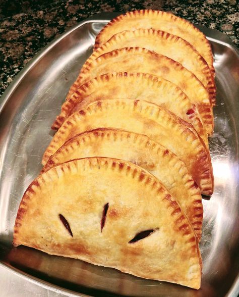 These beautiful, flaky turnovers are filled with sweet, juicy pluots, a plum-apricot hybrid. Made with a tender, buttery crust, these turnovers can be enjoyed for breakfast, as a dessert, or even as an on-the-go snack. Plums Recipes Dessert, Plums Recipes, Recipes Crepes, Turnover Recipes, Buttery Pie Crust, Plum Recipes, Breakfast Sweets, On The Go Snacks, Pastry Blender