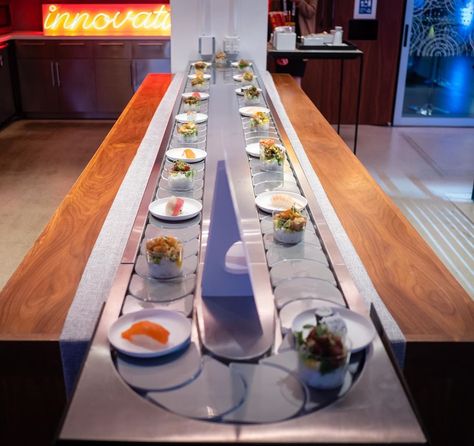 Pro-tip: Always have at least one thing that people will leave your event remembering. This innovative presentation by our partner @thomaspretieventstosavor is just that!   Our Conveyor Belt is making the rounds this season! #conveyorbelt #sushi #poke #catering #eventdesign #eventdecor #innovate #partywithpreti #food #foodphotography #nycevents #eventplanning #events ( #📷 @thomaspretieventstosavor ) #eventsbyblace #nyc #nycvenues @partyfood Sushi Train, Future Restaurant Technology, Sushi Restaurant, Running Sushi, Sushi Belt, Sushi Belt Restaurant, Sushi Conveyor Belt, Conveyer Belt Sushi, Conveyor Belt Design