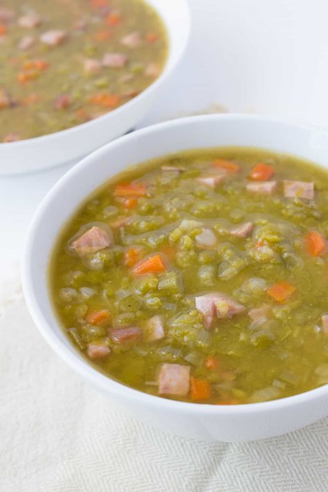 Ham And Split Pea Soup is a delicious use of leftover holiday ham. Split peas are cooked with ham, carrots and potato for a hearty and filling soup. #splitpeasoup #leftoverham #hamandsplitpeasoup Ham And Split Pea Soup, Split Pea Ham Soup, Paprika Pasta, Ham Soup Recipes, Homemade Ham, Split Pea Soup Recipe, Pea And Ham Soup, Leftover Ham Recipes, Holiday Ham