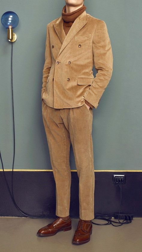 Man is wearing a camel corduroy double breasted suit  with a burnt orange turtleneck. Classic Mens Style Modern Gentleman, Speakeasy Outfit, January Photoshoot, Unique Suits, Ring Dance, Suede Suit, Corduroy Suit, Man Suits, Brown Suit