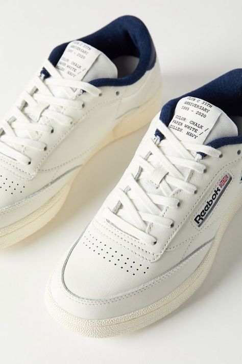 Celebrate the timeless Club C sneaker through the years with this anniversary edition by Reebok. Tennis-inspired silhouette features a minimalist leather upper with a woven label at the tongue and metal keychain at the laces. Eva footbed and rubber bottom. #sponsored Vintage Shoes Sneakers, Timeless Sneakers, Reebok Club C 85, Club C 85, Dr Shoes, Reebok Sneakers, Reebok Club C, 35th Anniversary, Club C