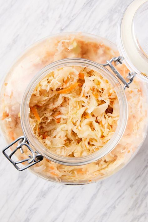 Sauerkraut is a great addition to so many types of meals and is simple to create at home. Homemade sauerkraut ferments over a few days and holds incredible taste while providing great probiotic benefits. Simply using kosher salt and cabbage, this sauerkraut comes together with minimal effort and equipment! | wyseguide.com #sauerkraut #preserving #summer #recipe #fermentation How Do You Make Saurkraut, Fermented Recipes, Make Sauerkraut, Traditional German Food, Cook Vegetables, Fermented Sauerkraut, Sauerkraut Recipe, Metabolic Health, Vegan Probiotics