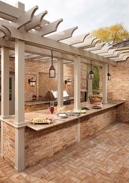 Picture Of an outdoor bbq zone built of stone and brick, with a grill, lanterns, a cooking countertop and a meal space Outdoor Barbeque Area, Design Per Patio, Design Grill, Outdoor Kitchen Countertops, Modern Outdoor Kitchen, Outdoor Barbeque, Outside Kitchen, Outdoor Kitchen Bars, Outdoor Kitchen Appliances