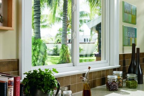 Kitchen slider vinyl replacement windows above sink show full view of outdoor space Window Above Sink, Slider Windows, Horizontal Sliding Windows, Window Over Sink, Window World, Slider Window, Fiberglass Windows, Above Sink, Vinyl Windows