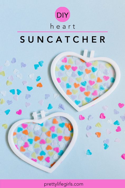 Valentine's Day Crafts for Kids: DIY Heart Suncatcher - The Pretty Life Girls | Making suncatchers is one of our favorite crafts to make with our kids, and because we love them so, we decided to give them a Valentine's Day twist with this DIY heart suncatcher project! These are so easy to make, and they're sure to delight you when you spy the hearts shining in the window. Click to learn how to make them! Chakra Crafts, Making Suncatchers, Fun Valentines Day Ideas, Heart Suncatcher, Valentine's Day Crafts, Diy Heart, Valentine's Day Crafts For Kids, Pretty Life, Valentine Crafts For Kids