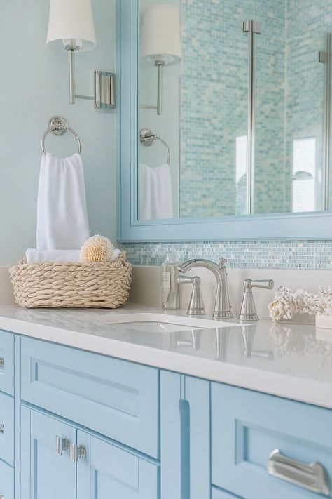 Transform your space with modern bathroom ideas in soothing coastal blue tones. This chic setup features a stylish vanity, elegant fixtures, and a beachy decorative touch, giving you a serene retreat at home. #ModernBathroomIdeas #HomeDecor #CoastalDesign Coastal Bathroom Vanities, Coastal Vanity, Coastal Bathroom Vanity, Calming Spaces, Coastal Bathrooms, Coastal Blue, Coastal Design, Modern Bathroom, Beach House