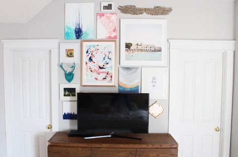 No matter what shape or size, TV’s can be a huge eye sore in a room! When I started the re-design of my master bedroom I new I wanted to incorporate my TV more organically into the decor so it wouldn’t stick out like a sore thumb. I did some Pinterest stalking and realized I wasn’t … Wall Behind Tv, Tv Gallery Wall, Tv Wand, Sweet Photo, Gallery Wall Inspiration, Tv Wall Decor, Diy Tv, Home Decor Crafts, Happy House