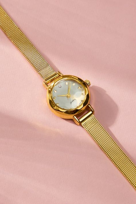 This dainty round face watch, features a slim gold mesh wrist band. Slim in style, this watch is perfect to add to a wrist stacked with bracelets or alone for a sophisticated style. Small Watches Women, Slim Watches, Wrist Stacks, Timeless Watches, Small Watch, Gold Watches Women, Affordable Watches, Wrist Band, Jewelry Lookbook