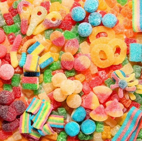 Assorted variety of sour candies includes extreme sour soft fruit chews, keys, tart candy belts and straws. Flat lay, sugar background concept for kids birthday party. Sour Skittles, Healthy Candy, Fruit Chews, Sour Fruit, Artificial Food, Dessert Dips, Sugar Candy, Sour Candy, Packaged Food