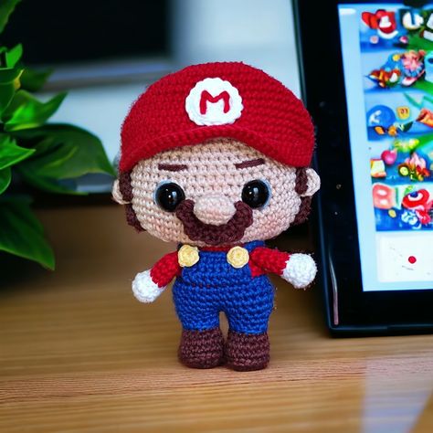 Em um mundo cheio de cogumelos e aventuras, encontrei o Super Mario em amigurumi! 🌟 Feito com todo o carinho e detalhes, ele é a adição perfeita para qualquer coleção de fãs. Faça sua encomenda pelo direct 📱 📏Tamanho 15 cm R$ 100,00 #amigurumilove #amigurumibrasil #amigurumipersonalizado #FunkoPop #Amigurumi #SuperMario #Nintendo #FeitoÀMão Super Mario, Funko Pop, Nintendo, Mario, Amigurumi, On Instagram, Instagram