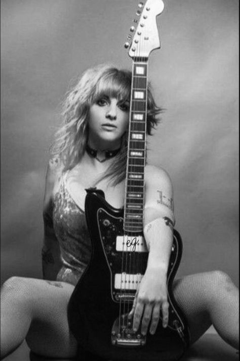 Holding A Guitar, Female Artists Music, Female Guitarists, Rock And Roll Girl, Rock Poster Art, Heavy Metal Girl, Guitar Photography, Rocker Girl, Women Of Rock