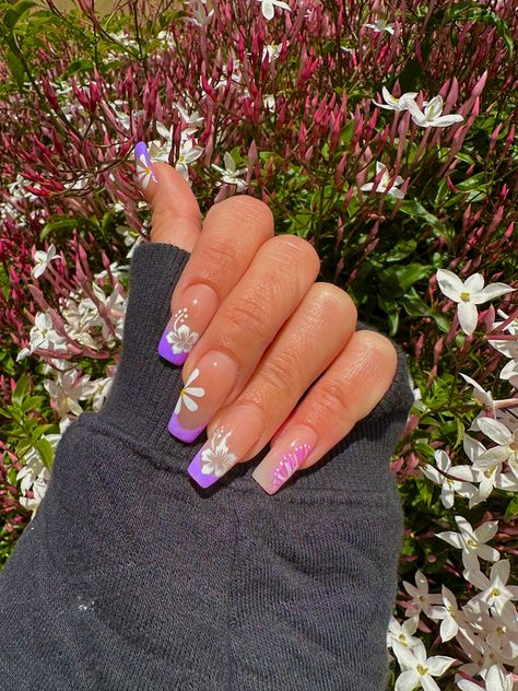 Purple french tips with white flowers! #nails #purplenails #springnails #springnailart #flowers #nailart #nailpolish #nailsoftheday #nailinspiration #nailinstagram French Tips With White Flowers, White Flowers Nails, Purple French Tips, Hawaii Nails, Disney Acrylic Nails, Purple French, Flowers Nails, Lavender Heart, Purple Nail Designs