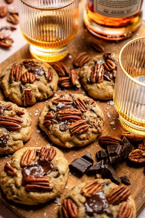 These easy, soft, and gooey bourbon pecan chocolate chip cookies start with bourbon-soaked pecans and are mixed with loads of chocolate chips and the perfect cookie dough! If you love bourbon and chocolate, these are the PERFECT cookies for you! Chocolate Bourbon Cookies, Bourbon Butterscotch Cookies, Bourbon Cream Cookies, Whiskey Chocolate Chip Cookies, Bourbon Pecan Chocolate Chip Cookies, Bourbon Chocolate Chip Cookies, Bourbon Treats, Bourbon Pecan Cookies, Bourbon Cookies Recipe