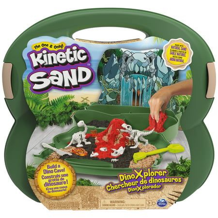 Dig and discover dinosaur bones and prehistoric treasure with the Kinetic Sand Dino Xplorer playset! This playset features a total of 1.5lbs of Kinetic Sand, including beach sand (1lb), black (0.25lb) and red sand (0.25lb)! Use the included rake and knife to build out your own ancient dinosaur cave. Imprint fossils using the amber fossil mold. Uncover dinosaur bones and put it together to reveal 3 dinosaurs! Kinetic Sand is the original magical, moldable and mesmerizing play sand. Better than ar Dinosaur Cave, Build A Dino, Kids Play Dough, Play Sand, Plastic Beach, Red Sand, Sand Play, Sand Toys, Kinetic Sand