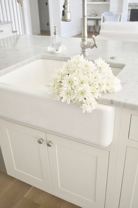 A classic white farmhouse sink from Kohler. Kohler products are available through Snow and Jones. Small Farmhouse Sink, Classic White Farmhouse, Farmhouse Sink Vanity, Corner Kitchen Sink Ideas, Kohler Farmhouse Sink, White Kitchen Floor, Corner Kitchen Sink, Kitchen Window Blinds, Kitchen Sinks And Faucets