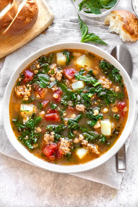 Tuscan Kale and Sausage Soup | The Cozy Apron Sausage Kale Tomato Soup, Tuscan Sausage Soup, Kale And Sausage Soup, Sausage Potato Kale Soup, White Bean Soup With Kale, Bean Soup With Kale, Kale And Sausage, Tuscan White Bean Soup, White Bean Kale Soup