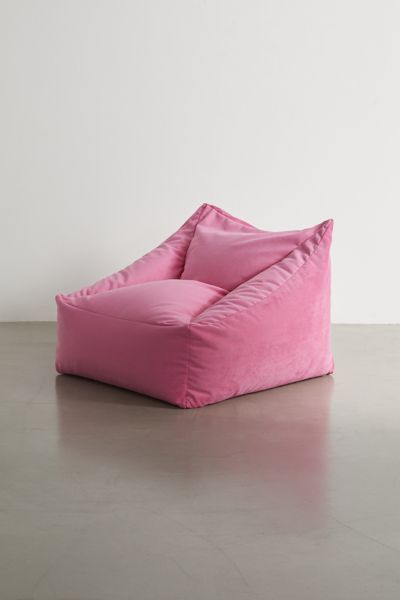 Instantly elevate your reading nook with the coziest bean bag chair with a plush velvet cover and supportive bead fill. Features a boxy silhouette for a modern look we love. This custom furniture piece will be made to order just for you. Features Cozy bean bag chair Plush velvet cover Bead filling offers a supportive seat Boxy silhouette adds a modern flair Made to order just for you Content + Care Arrives fully assembled Polyester; polystyrene beads Spot clean Made in the USA Size Dimensions: 3 Pink Beanbag Chair, Comfy Bean Bag Chairs, Cool Bedroom Chairs, Cool Room Things, Cozy Seating Area In Bedroom, Bean Bag Chair Aesthetic, Seating In Bedroom, Pink Bean Bag Chair, Cozy Bean Bag