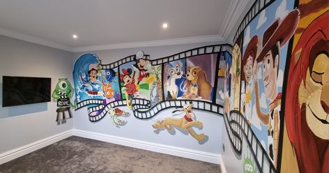 Disney painted mural for children's tv room pluto monsters inc Disney Feature Wall, Disney Themed Mural, Disney Movie Room Ideas, Disney Painted Wall Mural, Movie Murals Wall Art, Disney Room Painting, Lilo And Stitch Home Decor, Lilo And Stitch Mural, Disney Mural Ideas