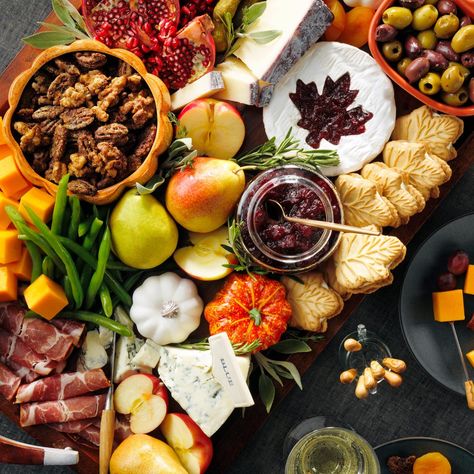 Thanksgiving Charcuterie Board: How to Make It | Taste of Home Home Charcuterie Board, Thanksgiving Charcuterie Board, Charcuterie Picnic, Highbush Cranberry, Fall Appetizers Easy, Thanksgiving Charcuterie, Maple Leaf Cookies, Blanching Green Beans, Club Crackers