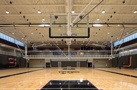 Stahl | Education Design  | The luminous school gymnasium showcases the school brand and identity at Johnston High School in Johnston, Iowa, by Stahl Construction. #mortarr #commercialconstruction #gymdesign Korean School Gymnasium, School Gym Design, Yn As Kpop Idol, School Building Plans, Ruang Gym, School Gymnasium, Gym Design Interior, Underwater Restaurant, Classroom Interior