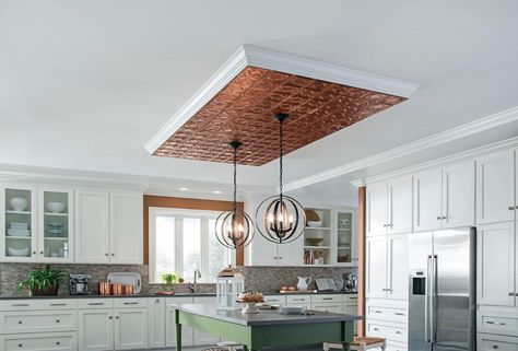 Use decorative metal panels to add some shine above your kitchen island or other focal point in your space. Copper Ceilings, Beautiful Ceiling Designs, Decorative Ceiling Panels, Sloping Ceiling, Kitchen Ceiling Design, Accent Ceiling, House Ceiling, Armstrong Ceiling, Copper Ceiling