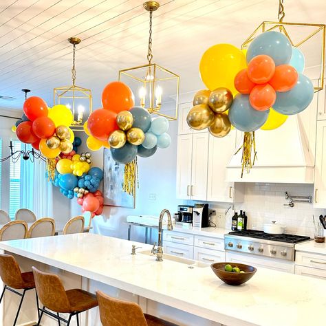 These colors are everything!!! #balloonbundles #balloonchandelier #balloondecor #balloondecor #nolaballoons #balloonsnola | Instagram Umbrella Balloon Garland, Balloon Garland Around Window, Hanging Balloons, Balloon Chandelier, Backyard Bbq Party, Balloon Clusters, Bridal Shower Balloons, Sesame Street Birthday Party, Baby Event