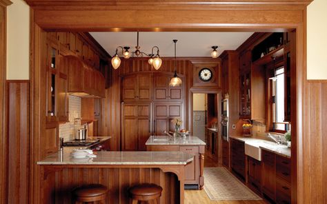 All wood victorian kitchen with farm sink and island. Monochromatic maximalism. Victorian Maximalism, Kitchen Wood Cabinets, Closed Kitchen Design, Victorian Style Kitchen, Wainscoting Bathroom, Closed Kitchen, Dark Wood Kitchens, Diy Wainscoting, Classic White Kitchen