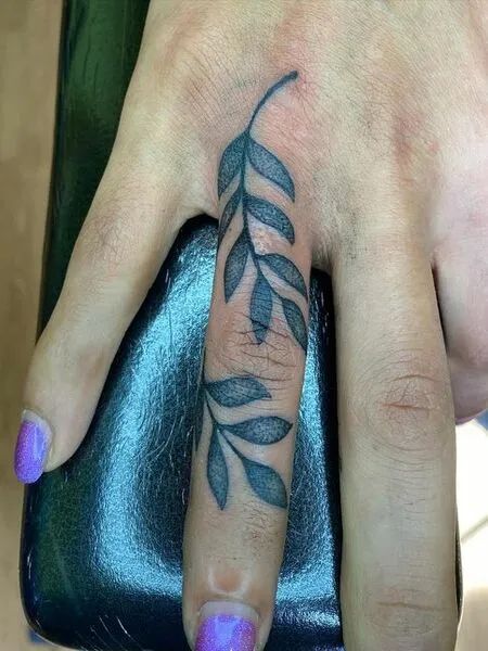 Leaves Finger Tattoo Leaves Finger Tattoo, Leaf Finger Tattoo, Infinity Finger Tattoos, Meaningful Finger Tattoos, Henna Finger Tattoo, Finger Tattoos Fade, Finger Tattoos For Women, Side Finger Tattoos, Flower Finger Tattoos