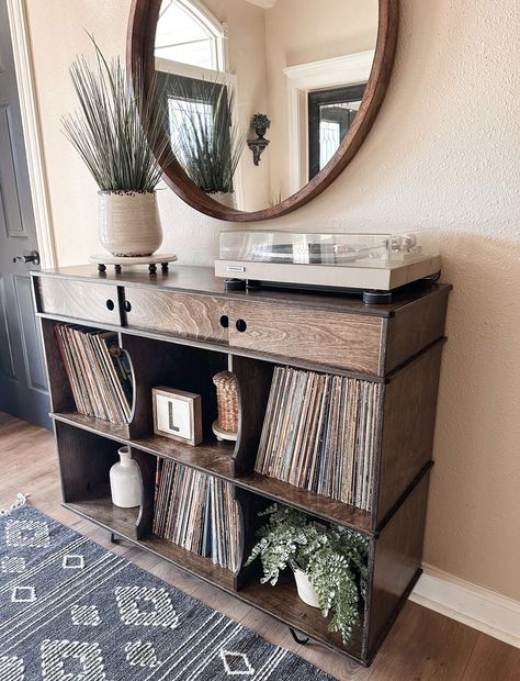 This elegant open storage option boasts a beautiful aesthetic and fits seamlessly into any room from entryways to laundry spaces. Our handcrafted cabinet provides an optimal organization solution. Every cubby is carefully constructed with an arched shape for effortless retrieval of items. Here is what you need to know about this listing to get you started:Credenza Record StorageFinish: shown - dark brownLength: 48 in.Depth: 16 in.Height: 38 in. high including the feet Cubbies are 13 high by 15 d Entry Way Credenza Decor, Entryway Credenza, Credenza Storage, Record Storage Cabinet, Credenza Decor, Top Of Kitchen Cabinets, Birch Cabinets, Cube Storage Unit, Hidden Compartments