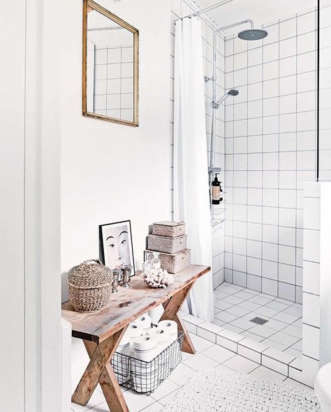 Simple accessories add personality to this small bathroom, with an old bench utilised as storage for wet room essentials. To see more of this Scandi-style home that mixes old with new, hit the link in our bio.  Styling - Luke Foged Photography - Morten Holtum/Living Inside Bathroom Storage Bench, Bathroom Bench, Old Benches, Square Tiles, Scandinavian Bathroom, Wet Room, Hall Bathroom, Shower Bench, Bench Decor