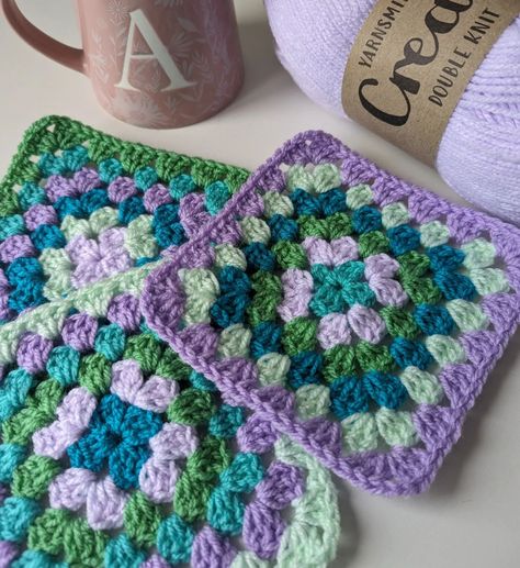 🦚💚 are you ready for some peacock vibes 💚🦚 . I bought these gorgeous shades from @woolwarehouse quite a while ago with the intention of making a granny square blanket but never got around to it, until today! 😍🦚 . These are @yarnsmiths create DK and the shades are, pale lilac, lilac, mojito green, tropical teal, sea foam and hint of mint.... Even the names are epic 😍🦚😂 . I plan on bordering them with the pale lilac and I want to do a round of granny square then a round of trebles in each stit... Purple Granny Square, Pale Lilac, Granny Square Blanket, Square Blanket, Peacock Feather, Christmas Bags, Double Knitting, Mojito, Sea Foam