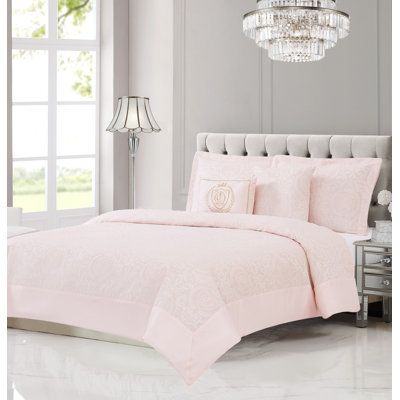 Bring effortless luxury into your bedroom with the Juicy Couture Dovona bedding set. This 5-piece set is as comfortable as it is stylish and available in Queen and King sizes. Size: Queen Comforter + 2 Shams | Juicy Couture Comforter, Shams, & Dec Pillows Pink Microfiber 5 Piece Comforter Set Polyester / Polyfill / Microfiber in Pink / Yellow | Wayfair Pillows Pink, Dec Pillows, Pink Comforter, Cotton Comforter Set, Reversible Comforter, King Comforter Sets, Cotton Comforters, Teen Bedding, Queen Comforter Sets