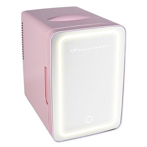 Frigidaire .35 Cu.-Ft. 15-Can Mini Portable Personal Fridge - Pink The Pink Frigidaire Portable Personal Fridge keeps your food and drinks the ideal temperature while at home and on the go. The ultimate versatile cooler, this mini fridge has a compact, space-saving design and lightweight features that make it easy to take with you anywhere while the lighted mirror door serves as a handy place to apply makeup. A removable shelf makes it easy to store milk, juice, yogurt, bottles, smoothies, chees Pink Skincare Fridge, Mini Food Fridge, Purple Mini Fridge, Mini Fridge For Food, Mini Fridge Pink, Cheap Mini Fridge, Mini Fridge In Bedroom Aesthetic, Mini Skincare Fridge, Pink Mini Fridge